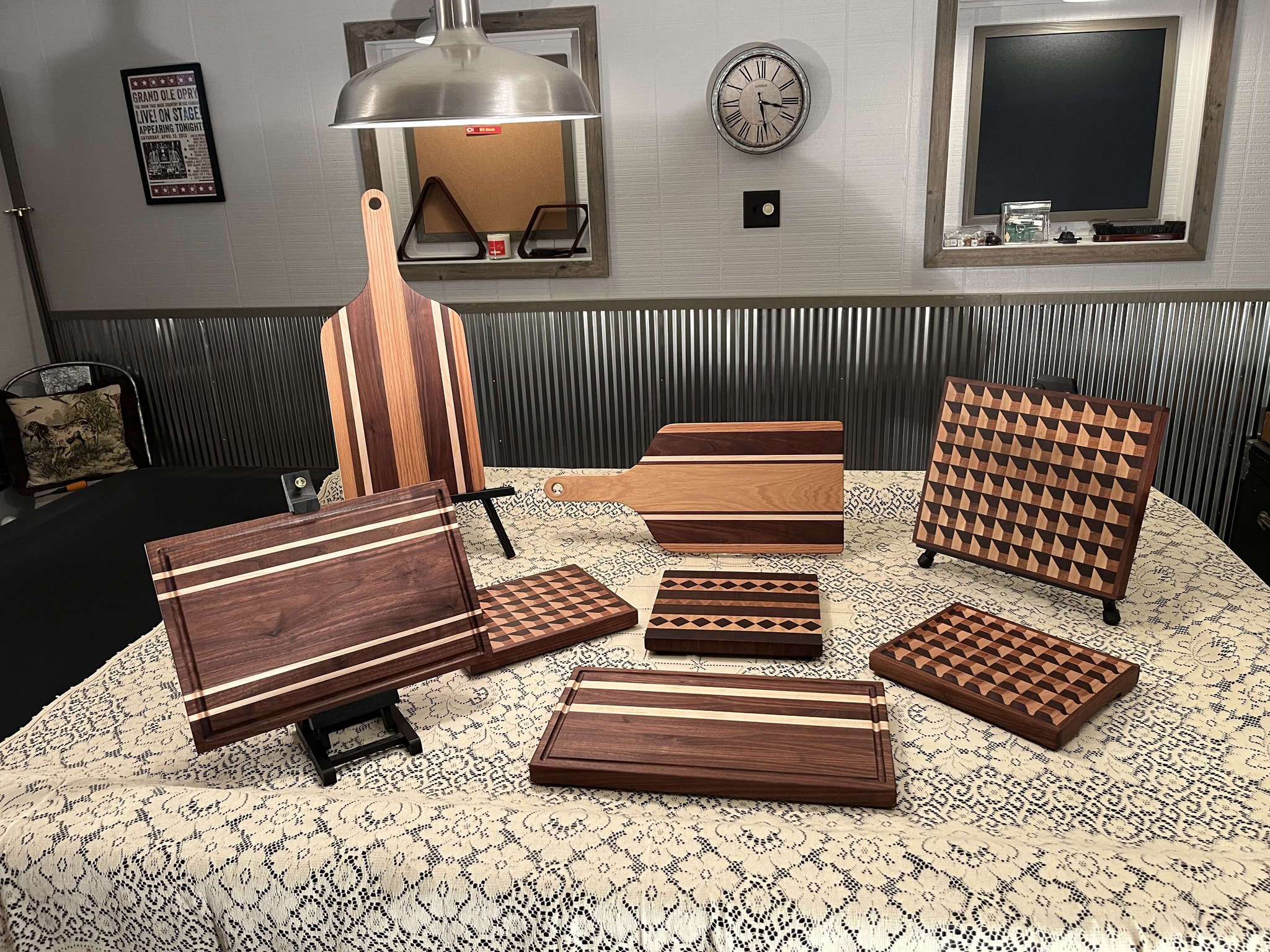 handcrafted wood items including cutting boards displayed on a table